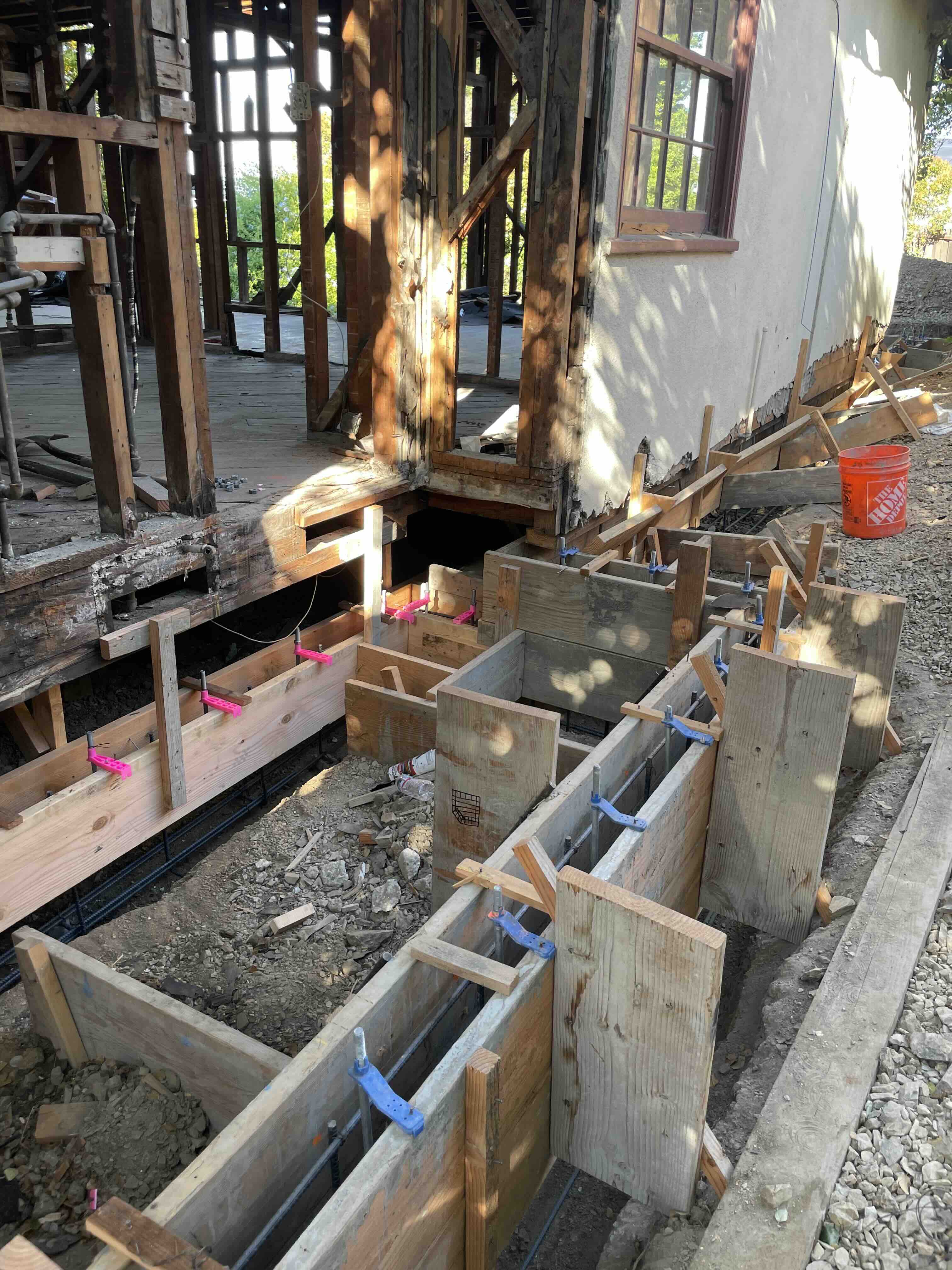 New foundation at a home addition with rebar in place before pouring concrete